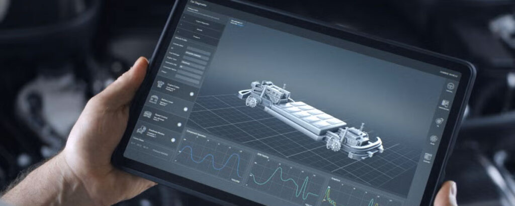 A person looking at an EV battery on a tablet